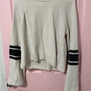 White and navy blue sweater